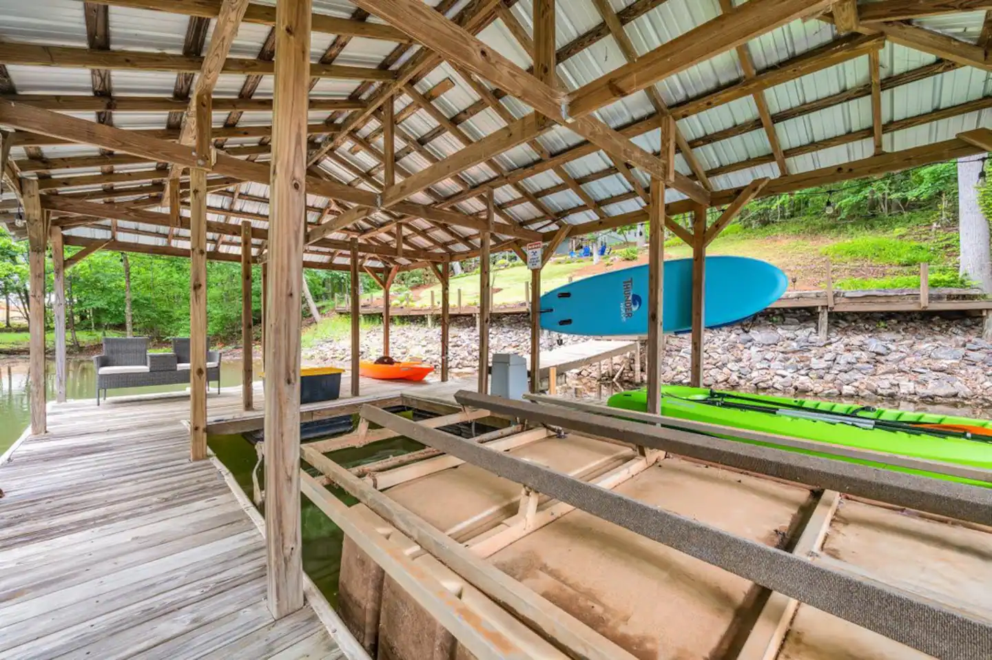 6-9 ft boat dock accessible for guests, along with a jet ski lift, and 2 kayaks, and a SUP!