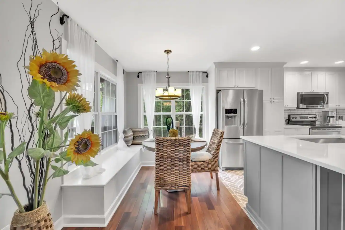 Kitchen nook seating with wrap around bench, seating for 8.