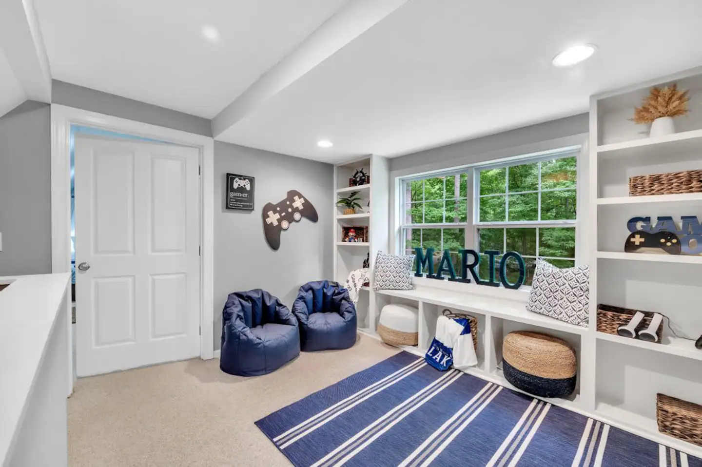 Game console in between 2 addt'l guest bedrooms upstairs level.