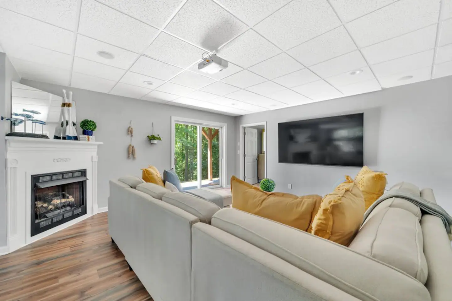 2nd Living Room Lower Level - 85" Entertainment TV + Sound System